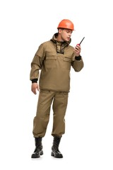 Man in working clothes and helmet isolated view