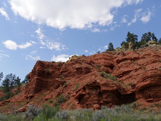 Close upward shot of red mountain cliffs near the Devils Tower in Wyoming.