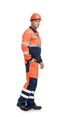 Man in working clothes and helmet profile view