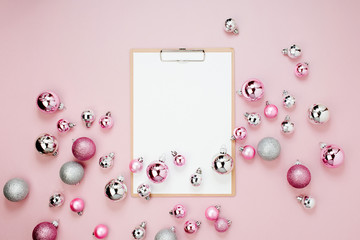 Clipboard mockup  Christmas decor. Arrangement in pastel pink colors.