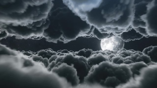 Beautiful fantastic flight among cumulus-lush clouds in the night moonlight