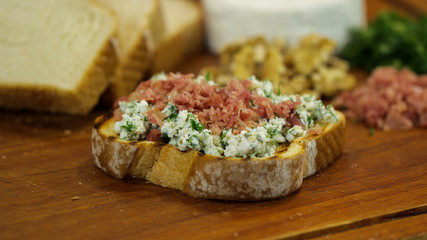Homemade bruschettas in toasted loaf bread