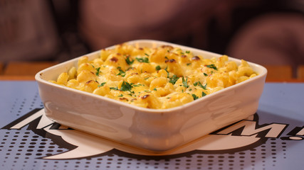Mac and cheese served on a white tray