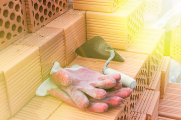 Mason bricklaying background with trowel and clay brick blocks