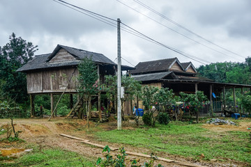 Old wooden house in one of the villages of Vietnam. Quan Binh Province