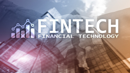FINTECH - Financial technology, global business and information Internet communication technology. Skyscrapers background. Hi-tech business concept