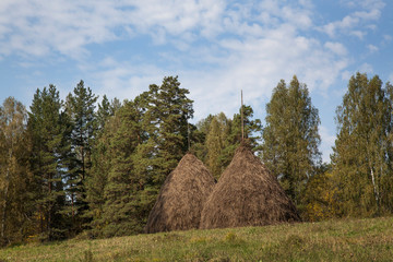 Haystacks in Bashkir villages located in the mountains