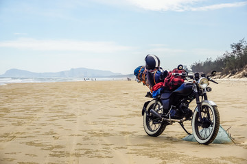 Obraz premium Motorcycle tour of Vietnam. Motorcycle on a wild beach in Vung Tau