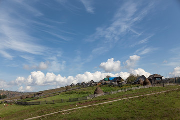 Haystacks in Bashkir villages located in the mountains