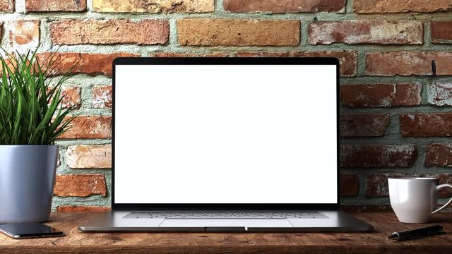 Laptop with a blank screen template and with camera slide or zoom out from the laptop screen