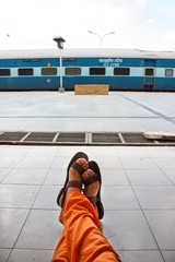 waiting for the departure of the train to delhi in jaisalmer, rajasthan, india