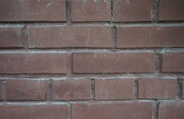 Grunge dirty old brick stone wall. construction of warm brick houses.