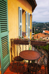 a rusted table on a small terrace  in a typical French provence town, Mougins city in which he spent his last years Pablo Picasso - 291585161