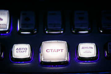 Casino. Gaming machine buttons. Inscriptions in Russian: payout, hold 1-5, rules, game selection,...