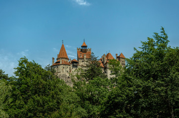 Bran, Transylvania region, Romania - June 10, 2018: medieval castle Bran in the Carpathian Mountains, Transylvania. The legendary residence of Count Dracula, Vlad Tepes. Tourist, historical and cultur