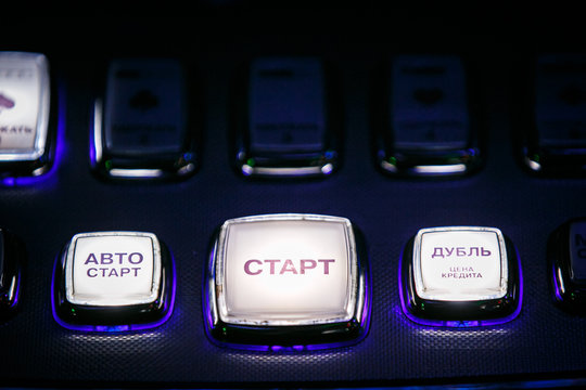 Casino. Gaming machine buttons. Inscriptions in Russian: payout, hold 1-5, rules, game selection, autostart, START, double, maximum bet, bet.