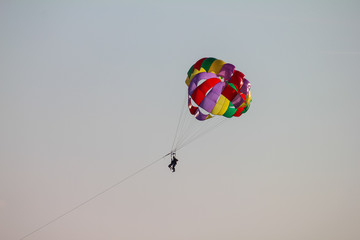 paragliding flying with two people over the sea of the côte d'azur, france