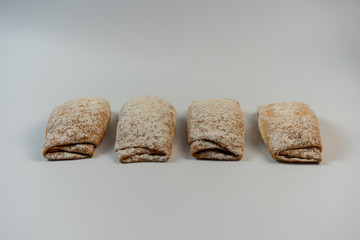 Tasty pastries on a white background