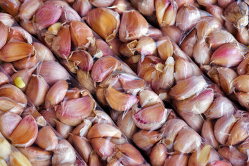 Closeup of bunch of unpeeled garlic