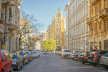 Fototapeta na wymiar European street daylight view blurred background