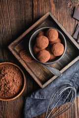 Delicious treat, homemade chocolate truffle covered in cocoa powder