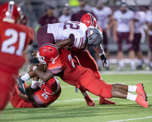 Great action photos of high school football players making amazing plays during a football game © Joe