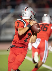 Great action photos of high school football players making amazing plays during a football game