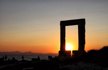 Silhouette of Naxos Portara, Apollo's 6th Cent BC temple ruins, overlooking Naxos town, Greek Islands