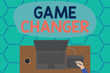 Conceptual hand writing showing Game Changer. Concept meaning Sports Data Scorekeeper Gamestreams Live Scores Team Admins Laptop wooden desk worker drawing tablet coffee cup office