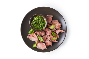 plate with sliced roast beef