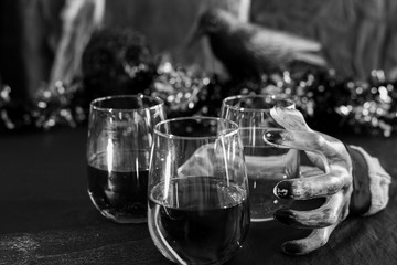 Halloween drinks with haunted hand