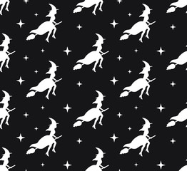 Vector seamless pattern of white witch silhouette and stars isolated on black background