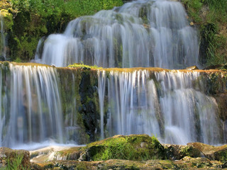 Stream water cascade in the waterfall