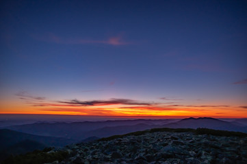 Starry sky before dawn in the mountains