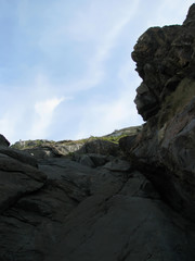 Brava beach coastline, the rocks reach the waterline - Rio de Janeiro - Brazil