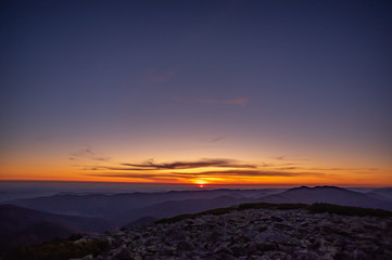 Starry sky before dawn in the mountains