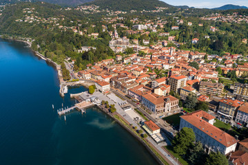Fototapeta na wymiar Aerial view of Luino, is a small town on the shore of Lake Maggiore in province of Varese, Italy.