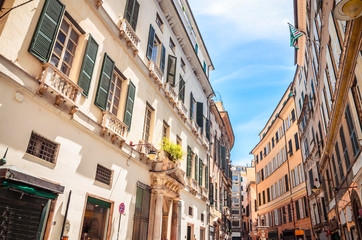 Fototapeta na wymiar Beautiful cozy streets of Genoa in summer day, Liguria, Italy