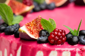Birthday Drip Cake with fresh berries (figs, blackberries, blueberries).