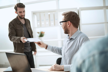 close up. employees of the company work with documentation