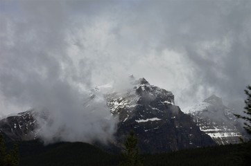 Majestic foggy mountains of the Canadian Rockies