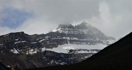 Majestic foggy mountains of the Canadian Rockies