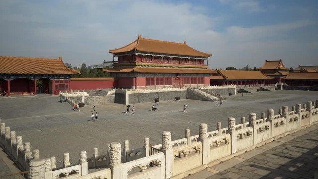 High angle view of tourists walking on footpath by historic buildings at Forbidden City against sky - Beijing, China