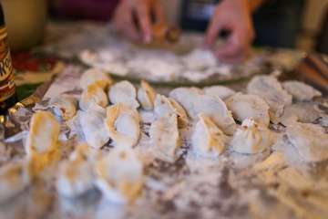 Mom making dumpling for transitional Chineses New year