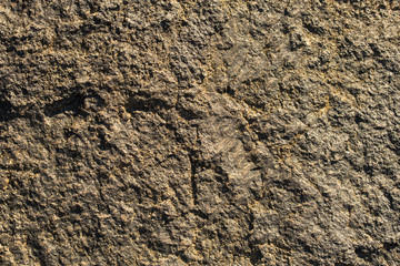 Rock plate. Colored stone surface. Wall of the house. Geology and Metamorphic rocks.