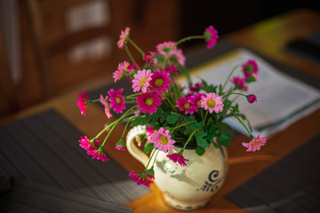 Pink flower bouquet on table