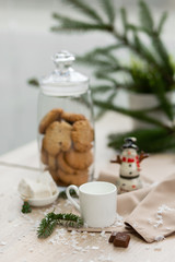 Bar counter in a coffee shop with New Year's decorations, cookies, sweets and coffee