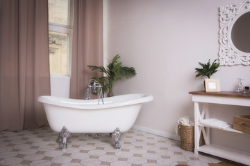 Fototapeta na wymiar White bathroom interior in a vintage style..