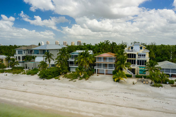 Aerial photo beachfront vacation homes Barefoot Beach FL
