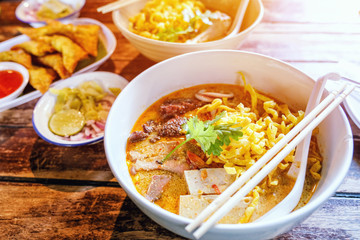 Northern Thai  Curried noodle soup (Khao soi) with chicken meat and spicy coconut milk